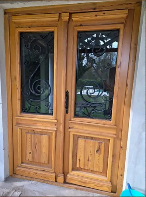 Puerta 2 hojas colonial tablero alto